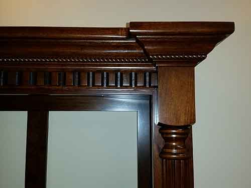 Custom rope molding on gun cabinet