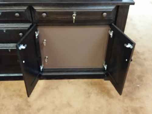 Steel safe doors on a custom Amish crafted guncabinet