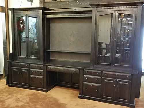 Gun cabinet with tv display in center