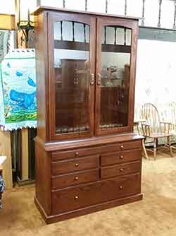 Custom Gun Cabinet crafted in oak for 12 guns.