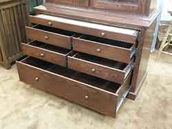 Five Full Extension Drawers and One Pull Out Cleaning Shelf