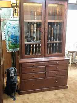 Loki, our store gun cabinet dog.