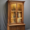 Gun cabinet with fly rod storage