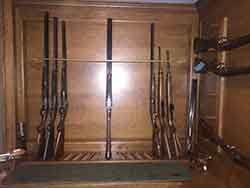 Gun Cabinet Installed in Customers Home with Rifles and Shotguns