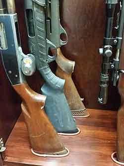 Gun Cabinet can display both single barrel rifles and double barrel shotguns