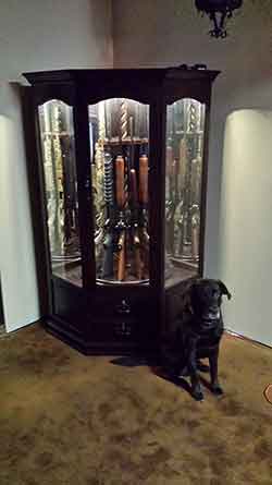 Loki the Gun Cabinet Dog with Custom Corner Gun Cabinet