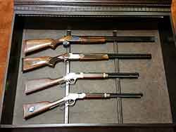 Test Fitting Rifles in Center Gun Cabinet Display Section