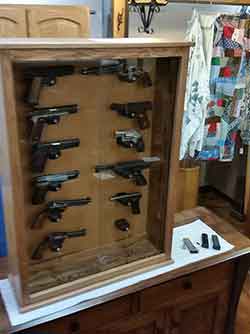 Pistol Wall Display Cabinet in solid Red Oak