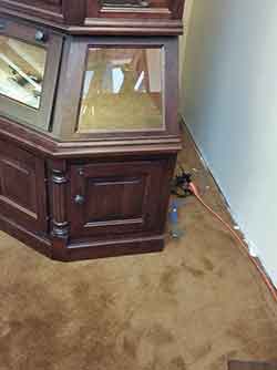 Corner Gun Cabinet Decorative Fluted Accents and Raised Panels