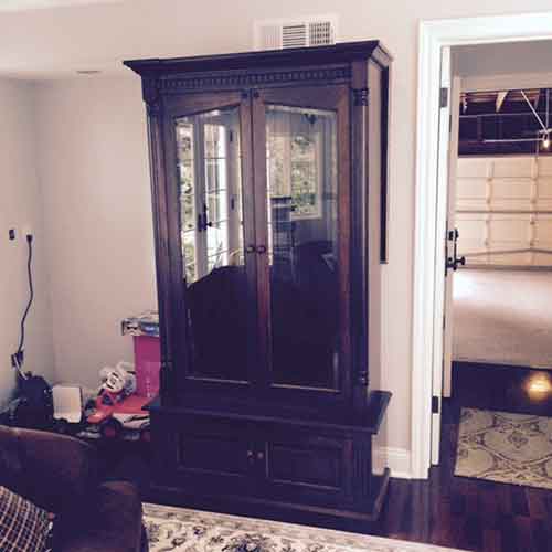 Amish made cherry gun cabinet at customer's house