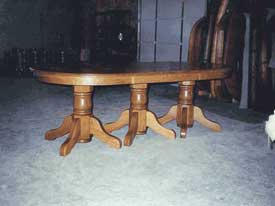 Triple Pedestal Oval Table with 10 Leaves