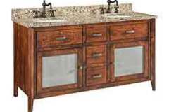 This vanity has a double sink and each side has its own storage space under it. The three small drawers down the center provide a place for most of your things.