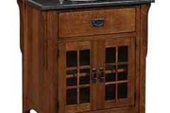 This is perfect if you have a half bath somewhere in your home. Quarter sawn Oak wood with a darker stain really show off the light black top.