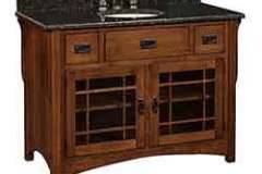 Here is a Mission vanity that is 49" wide. Inside the doors is an adjustable shelf. The sleek look is typical of the style.
