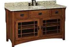 This 60" Mission style vanity has a lot of storage space in the cabinet. Brown Maple is the wood. You can choose one of our many
styles of counter tops or have one of your installed in your home.