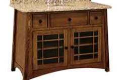 The McCoy custom vanity comes in the 49" size to accommodate a smaller bathroom. This one is shown in Brown Maple wood with a variegated colored counter top.