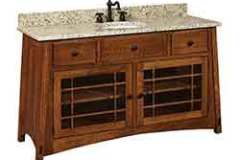 60" Amish built McCoy bathroom vanity with a single sink bowl. This design has a canted look to it but it is still considered a Mission style piece.