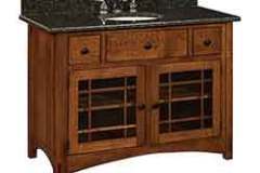 Our custom Amish vanity for that small bathroom is only 49" wide. It is made with the same quality and craftsmanship as it larger versions.
