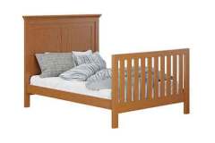 This is the Haven crib converted to a double bed in Red Oak wood with Seely #FC-44938