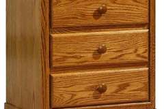 This is showing our Traditional 3-drawer nightstand that is custom Amish crafted. It is 23" wide and 27" high and shown here in Oak wood.  The drawers can be flipped to convert the cabinet into a changing station.