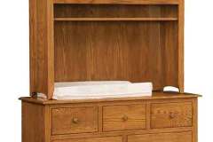 Our Monterey 7-drawer dresser comes here with the hutch top and changing pad. The shelf in the hutch top is adjustable.
