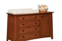 This is our McCoy 4 drawer dresser with the extra storage door and adjustable shelves and the changing pad on the top. Its made in Quarter Sawn Oak wood with Michael's Cherry stain.