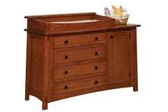This is our McCoy 4 drawer dresser with the extra storage door and adjustable shelves. Its made in Quarter Sawn Oak wood with Michael's Cherry stain.