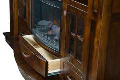 The Delgado Fireplace TV Stand features three full extension drawers with dovetailed construction.  Side mount drawer slides provide smooth easy opening and closing and superior support.