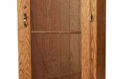 Amish crafted single door raised panel door and two drawers.  Shown crafted out of solid red oak with a Honey stain color.
