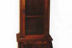 Our popular single door gun cabinet with lower display are perfect for pistols or knife collections.  Both display area feature LED lighting and lower cabinet has lockable full extension drawer.