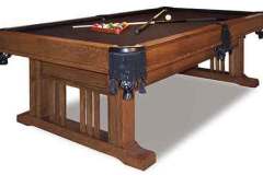 Amish Custom Crafted Signature Mission Pool table shown crafted out of solid quarter sawn white oak with a Michael's Cherry stain finish. Features premium carved leather pockets with rope tassels.
