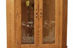 Our standard style Heritage double door corner gun cabinet.  This cabinet is deep enough to display long guns or even your archery equipment including compound and recurve bows.