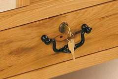 Many of our Amish made gun cabinets come with extra storage for gun cleaning supplies, accessories, and ammunition.  All drawers can also be fitted with locks upon request.