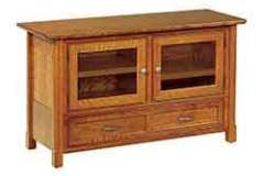 This picture shows an Amish crafted 2 door/2 drawer tv stand in 1/4 Sawn Oak wood.