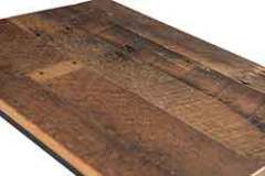 This is a picture of the custom style reclaimed barn wood top we can put on different pieces.