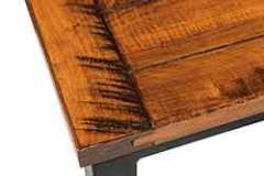 This is showing the plank top, the breadboard end, and the saw marks in the top. These can put on just about any desk style.