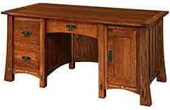 This is the 65" wide MG desk. It has a drawer in the center and a door on one side.