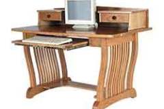 Here is a small computer desk. It is shown in the Royal Mission style with a topper.