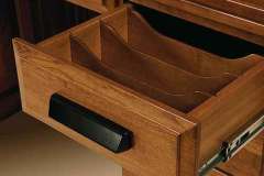 Here we see the removable dividers for the Deluxe custom roll top desk. Full extension drawer glides are standard.