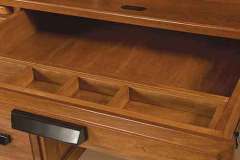 This drawer can be swapped for a keyboard pullout if needed. The desk is custom Amish crafted in the Deluxe Roll Top style.