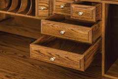 Storage drawers under the roll top of the Amish crafted Heritage desk. Many options are available.