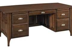 Smaller version of the custom Executive Classic style desk. It has raised panel drawers with full extension glides.