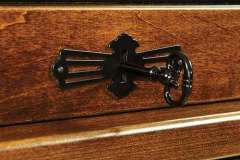 This shows the lock for the tambour on the custom Amish Classic style roll top desk. Keep valuables secure in this desk.