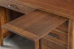 This Amish Country Squire desk has a writing pullout on both sides for your convenience. Shown here in Quarter Sawn Oak wood.