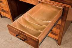 The drawer dividers in this Country Squire custom desk are removable.