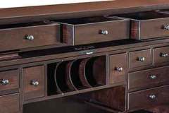 This is showing the drawer and cubby hole layout under the roll top of our Amish Mission roll top desk. These can be changed around to fit your needs.