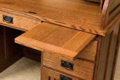 This is highlighting the writing pullout in our custom Amish Heritage desk. Shown in Quarter Sawn Oak wood with Michael's Cherry stain.