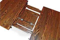 This picture shows the hardware needed for the custom butterfly leaf we offer on our Amish made tables. Most tables can have 2 of these installed. It allows for the leaf to fold in half and store conveniently under the table.