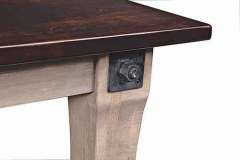 Check out the hardware on this Amish made custom CE leg table. It has a mortise and tenon joint for the legs to fasten to the table skirt with the shown bolt and nut.