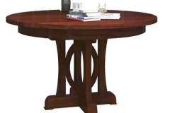 This custom crafted table really catches the eye. You don't see many tables with a base like this one. This base is suited to a round table with or without leaves and comes in several sizes.